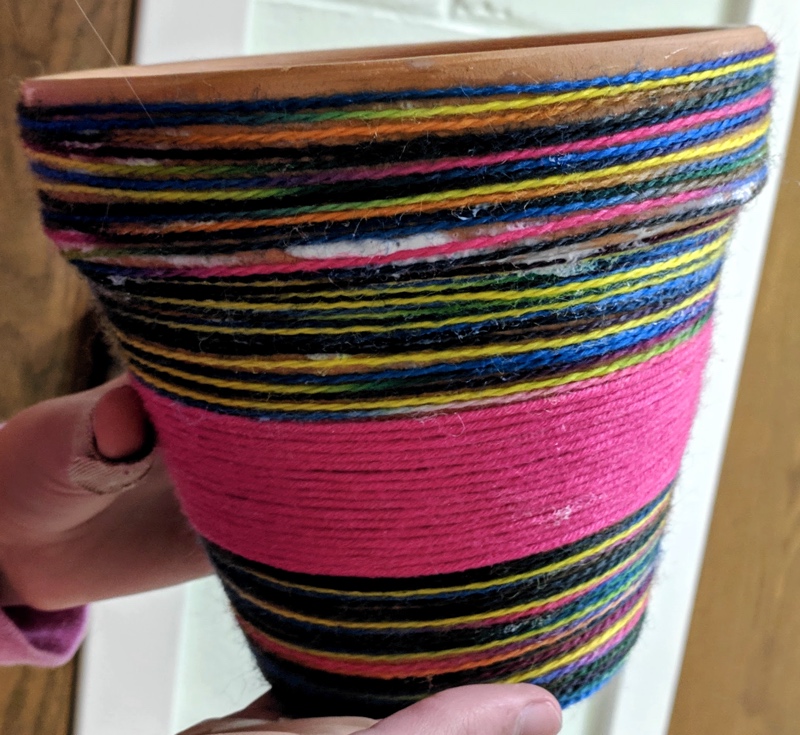 A student's decorated flower pot from the Spring 2019 Expressive Art Experience class with Valerie Geary at Planet Homeschool. Photo by Nic Rosenau.