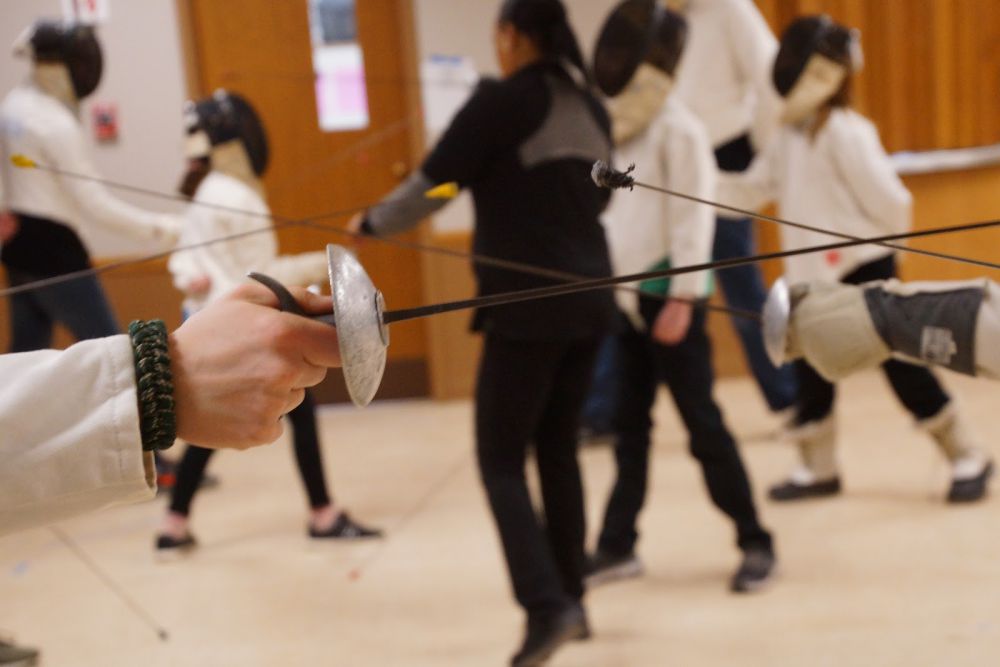 Maria Benford teaching fencing at Planet Homeschool in Spring 2019. Photo by Carrie Wilder.