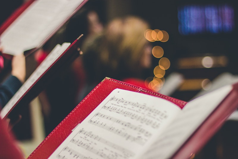 Photo of choral sheet music by David Beale on Unsplash.