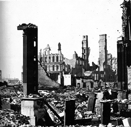 After the great Chicago fire of 1871, corner of Dearborn and Monroe Streets via Wikimedia Commons.