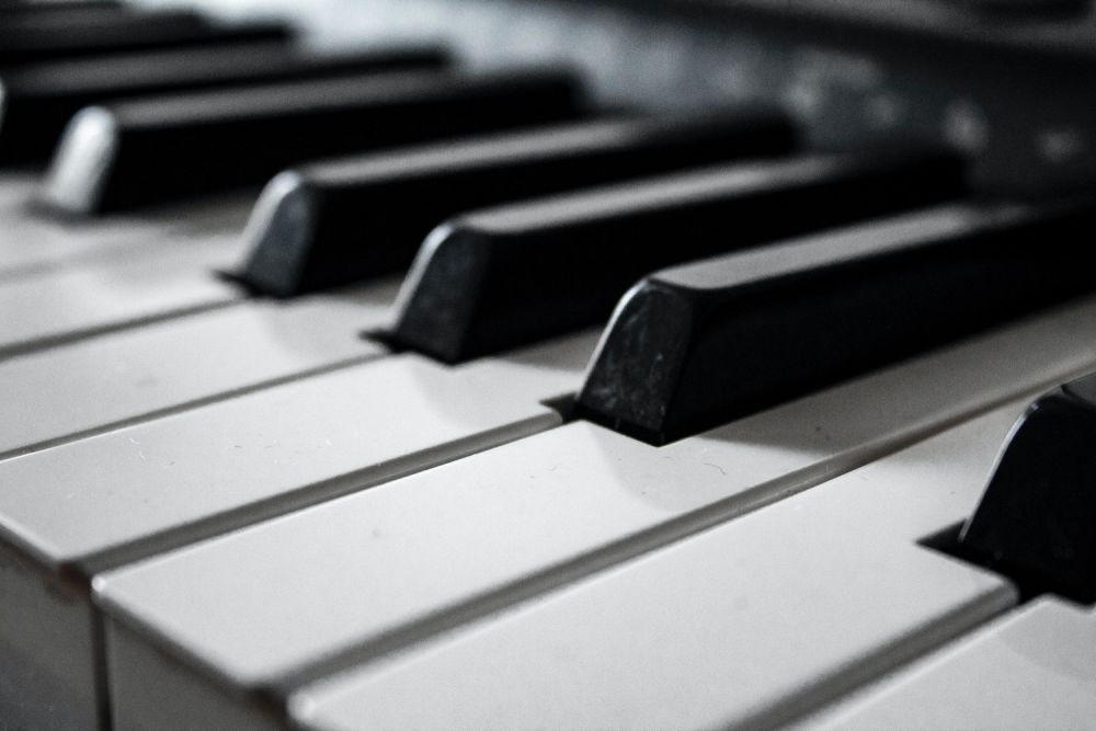 Close up on piano keys.