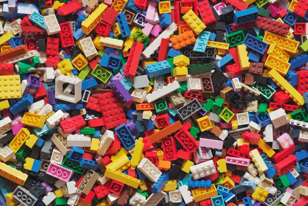 A jumble of multicolored LEGO bricks.