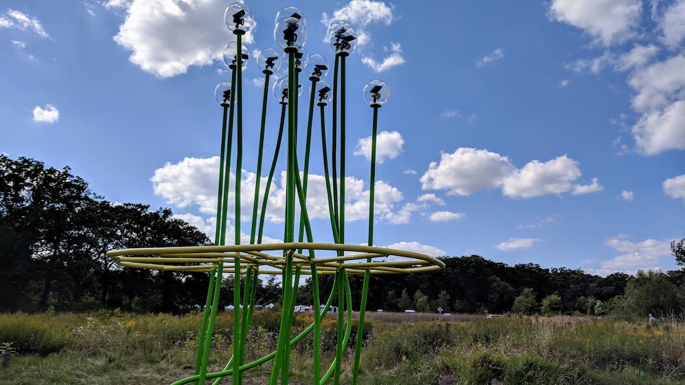 Wetland Grass by Asia Ward, fabricated steel, solar lights, plastic globes, 2018.